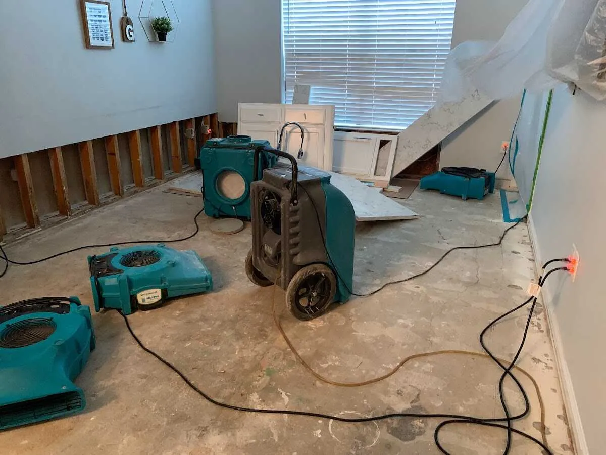Dehumidifier in flood-cut room for Water Damage Restoration in Porter